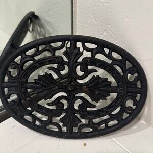 Vintage Black Cast Iron Oval Trivet with Scroll Motif